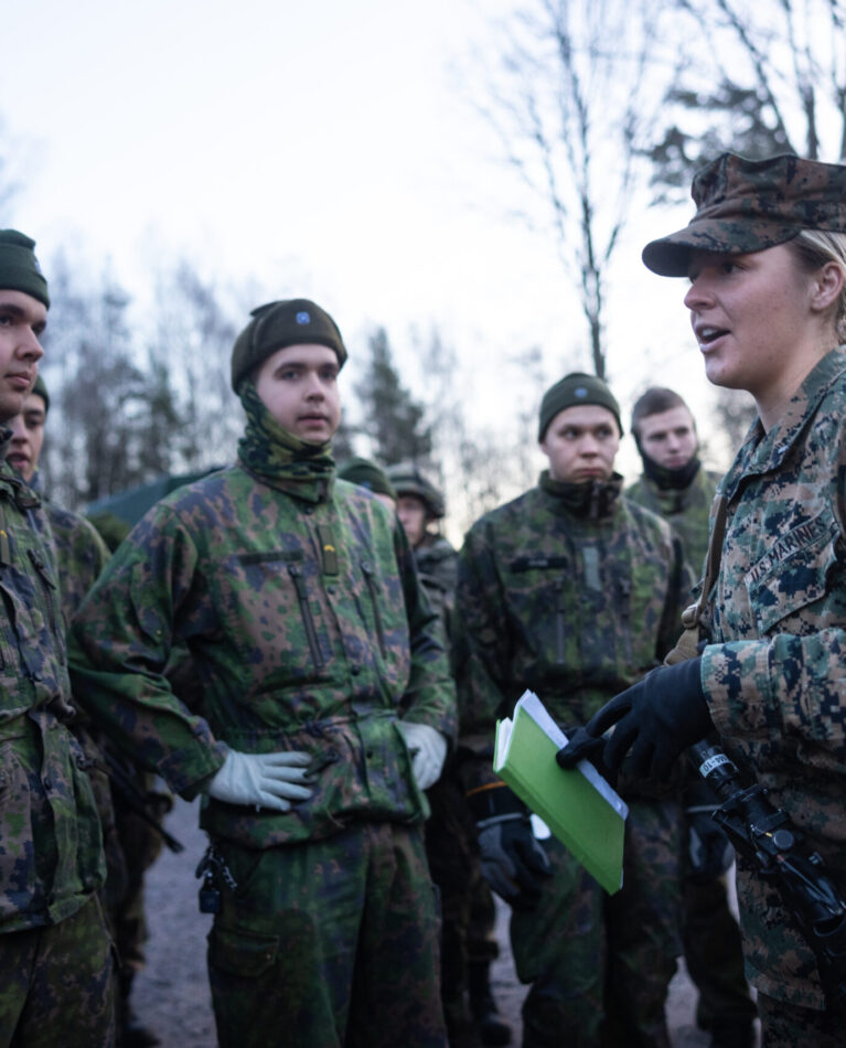 U.S. Marine Corps 1st Lt. Gillian Eby, a logistics officer, and native of Baltimore, gives U.S. Marines and Finnish soldiers a safety brief before a joint long-range convoy in preparation for Exercise Freezing Winds 24 in Dragsvik, Finland, Nov. 19, 2024. Freezing Winds is an annual Finnish-led maritime exercise involving U.S. Marines assigned to Marine Rotational Force – Europe and serves as a venue to increase Finnish Naval readiness and interoperability between NATO partners and allies in and around the Baltic Sea. (U.S. Marine Corps photo by Cpl. Meshaq Hylton)