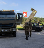 Members of the Swiss Armed Forces set up a static display of their equipment during the Tag der Bundeswehr event on Lucius D. Clay Kaserne, Osterholz-Scharmbeck, Germany, June 28, 2025. The event highlighted not only the Bundeswehr but also their allies, which include the United States, the Czech Republic, the United Kingdom, Switzerland, and France. (U.S. Army photo by Pvt. Kadence Connors)