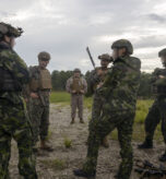 U.S. Marine Corps Lt. Gen. Calvert L. Worth Jr., the commanding general of II Marine Expeditionary Force, center-right, and Sgt. Maj. Anthony J. Loftus, the sergeant major of II Marine Expeditionary Force, center-left, greet Swedish armed forces members during exercise Burmese Chase 25 at Marine Corps Base Camp Lejeune, North Carolina, Aug. 12, 2025. Burmese Chase is an annual U.S. led, multi-lateral training exercise comprised of integrating ground and air fires, infantry tactics and naval gunfire alongside NATO allies to enhance combat readiness and interoperability. (U.S. Marine Corps photo by Cpl. Marc Imprevert) (This photo has been altered for security purposes by blurring out faces.)