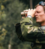 A Swedish Marine with the 2nd Amphibious Battalion, 1st Marine Regiment looks through a Leonardo DRS Individual Weapon System thermal sight during a demonstration on camouflage and concealment as part of exercise Archipelago Endeavor 25 in Berga, Sweden, Aug. 27, 2025. Exercise Archipelago Endeavor 25 increases compatible interoperability between the U.S. Marine Corps and Swedish Amphibious Forces by executing combined amphibious operations in and around the Baltic Sea littorals. (U.S. Marine Corps photo by Lance Cpl. Frank Sepulveda Torres)