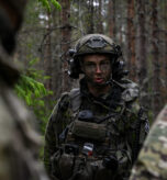A Finnish Defence Forces soldier confers with U.S. Army National Guard Soldiers May 28, 2026, during Exercise Karelian Sword 26 near Kouvola, Finland. Karelian Sword is a multinational training exercise designed to strengthen interoperability and readiness for the more than 10,000 troops participating from across the Finnish Defence Forces and partner nations. Approximately 35 Virginia National Guard Soldiers, primarily assigned to the 237th Engineer Company, will spend two weeks in Finland training alongside their Finnish counterparts. (U.S. Army National Guard photo by Sgt. 1st Class Terra C. Gatti)