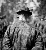 Soldier from the Finnish Army stand in formation during the Saber Strike 2014 opening ceremony. Original public domain image from Flickr